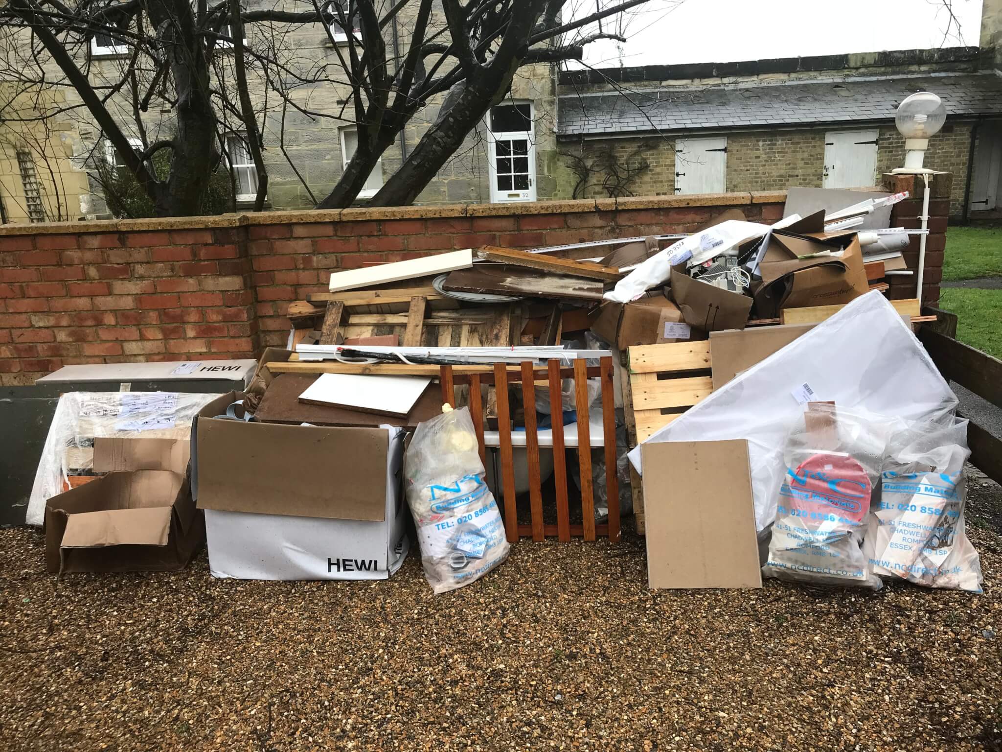 Garage clearance at retail unit in Eden Park — timber and plasterboard removed — Rubbish-Collection.com